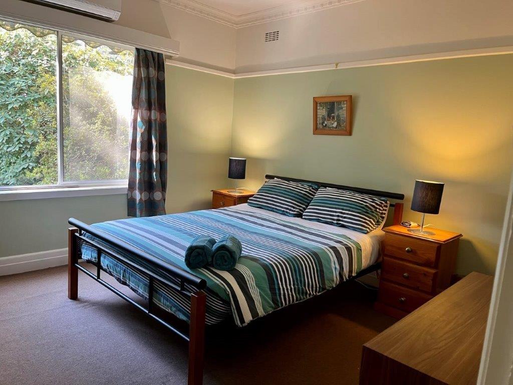 48delany-bedroom1-queen-bed